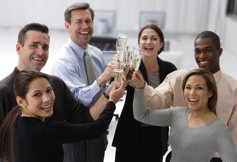 Business Associates Toasting Champagne --- Image by © Tom Grill/Corbis